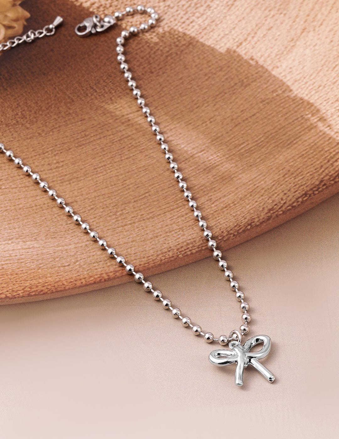 rhodium-plated-silver-beaded-chain-necklace-with-minimalist-bow-pendant-necklace-and-chains-36954409599150.jpg