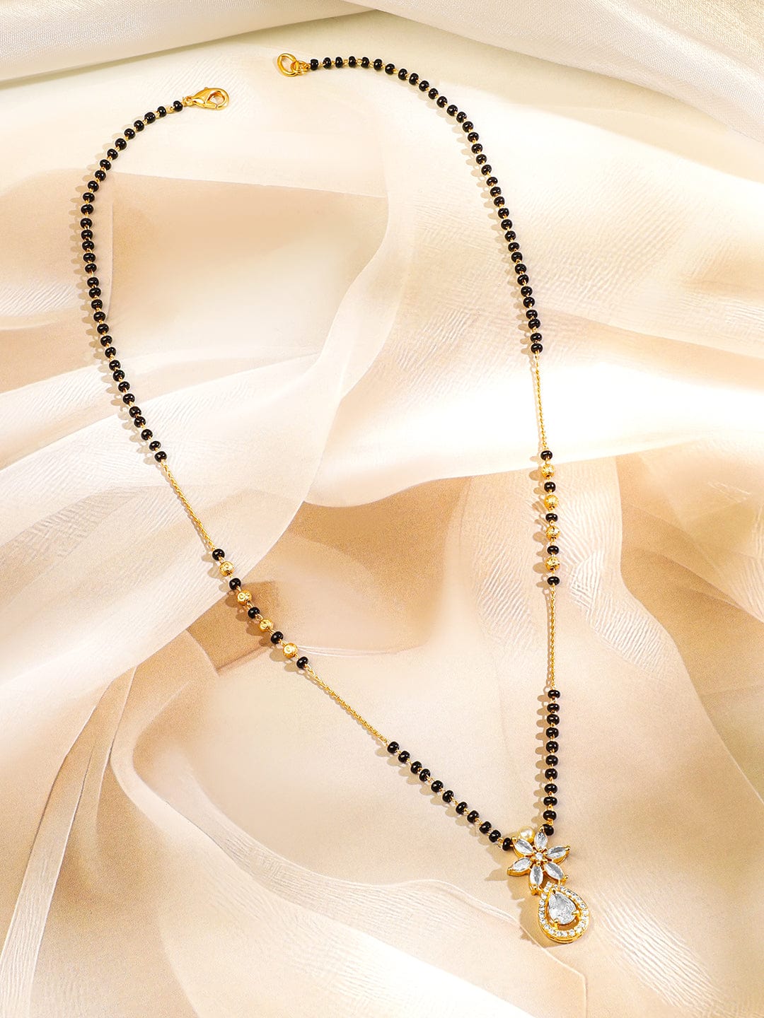 rubans-18k-gold-plated-white-cubic-zirconia-studded-floral-teardrop-pendant-mangalsutra-with-black-gold-beaded-chain-mangalsutra-1170454793.jpg