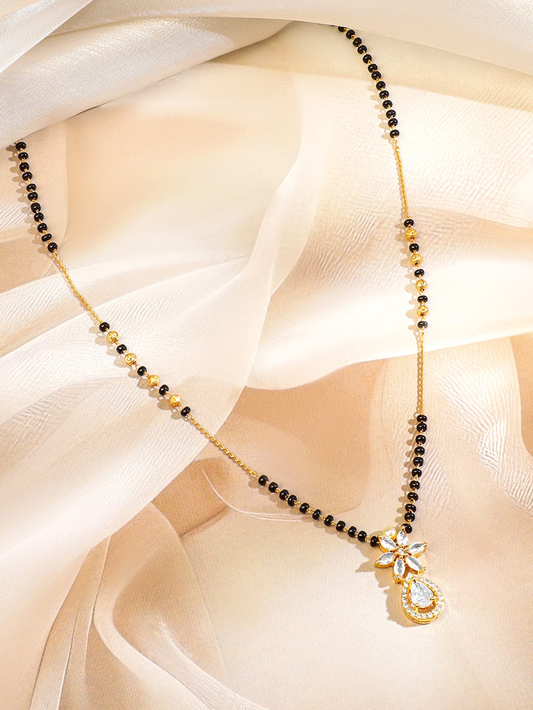 rubans-18k-gold-plated-white-cubic-zirconia-studded-floral-teardrop-pendant-mangalsutra-with-black-gold-beaded-chain-mangalsutra-1170454795.jpg