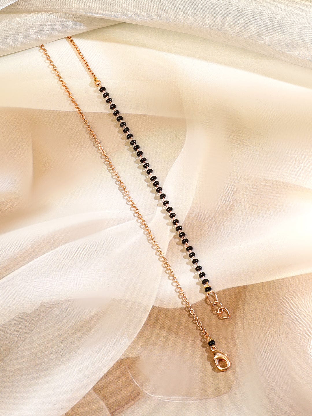 rubans-18k-rose-gold-plated-white-cubic-zirconia-studded-round-pendant-mangalsutra-with-black-beaded-chain-mangalsutra-1170454790.jpg