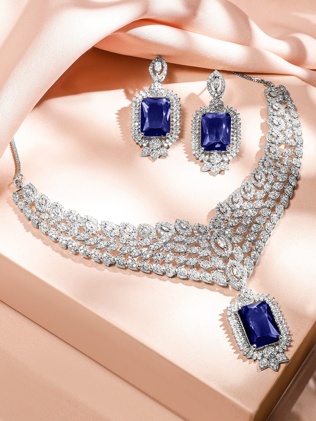rubans-rhodium-plated-blue-sapphire-white-cubic-zirconia-studded-luxe-v-shaped-statement-necklace-set-jewellery-set-1170331265.jpg