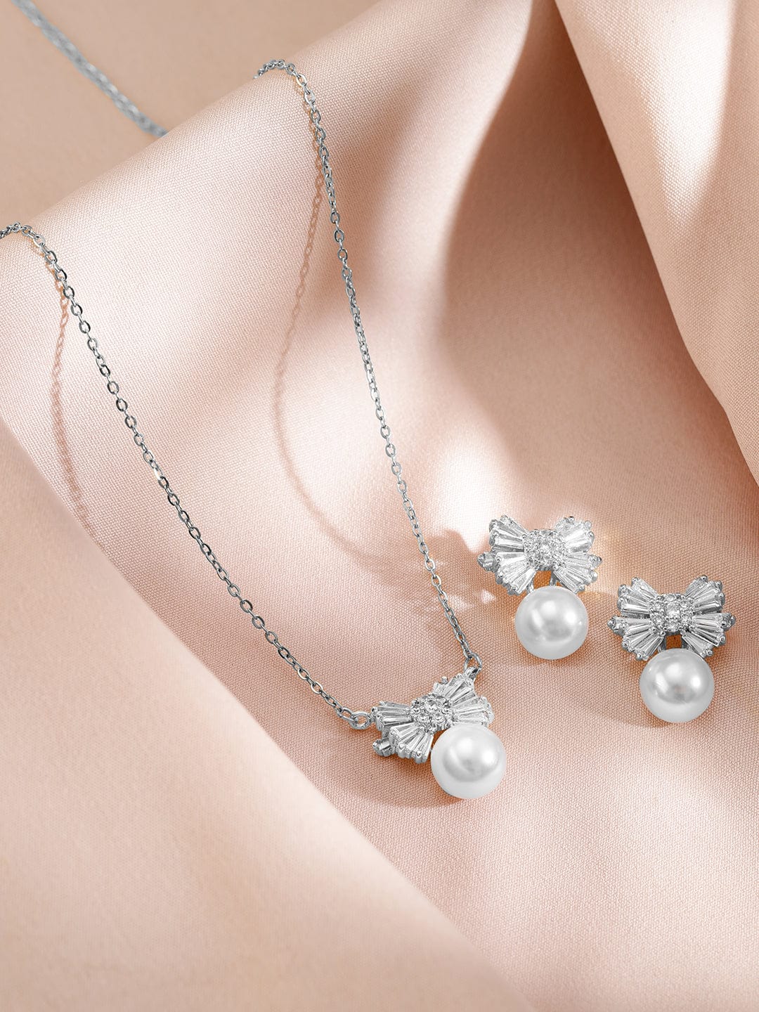 rubans-rhodium-plated-pearl-and-crystal-bow-pendant-necklace-and-earrings-necklace-chain-1143856226.jpg