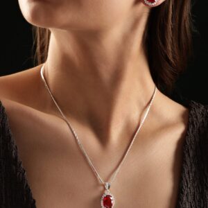 Rhodium plated Ruby Red zirconia Studded Oval Pendant Set - Grren