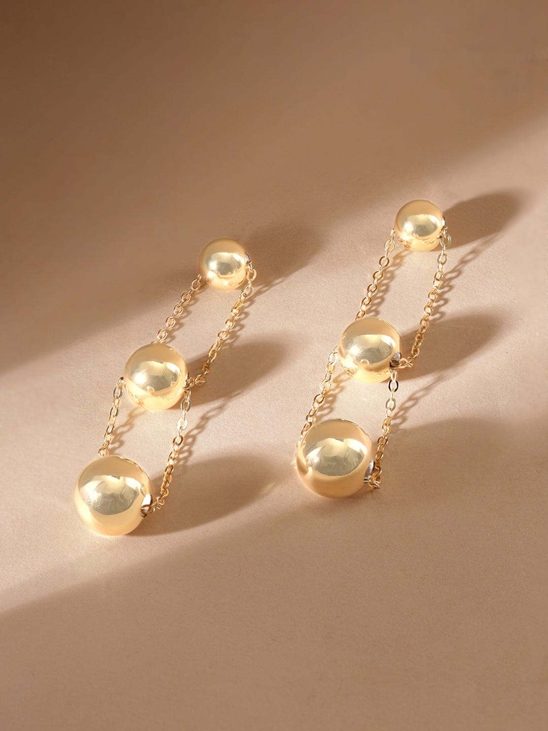 rubans-voguish-gold-dangle-earrings-earrings-34417474338990.jpg